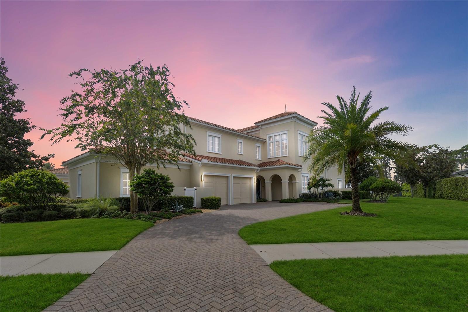 Fabulous View - Move-In Ready - Designer Furnished Model Coach Home! Welcome to Lake Nona Golf & Country Club and the introduction of the newest premiere model condominium residence designed and furnished by Design Guild Interiors LLC of Orlando, FL. To meet the increasing demand for complete turn-key furnished properties in the custom home market, this incredible Florida Urban Beach (c) lifestyle design offers the finest in luxury living within a private golf course community. Located directly on Lake Nona, a natural spring water private lake, and within 300 yards distance of the main clubhouse and amenities, this custom designed FIRST FLOOR residence offers every imaginable feature with total privacy and panoramic views of the Cypress Tree Preserve and pristine lake waters, dramatic sunrises and sunsets, and local deer visits.
This exclusive Coach Home community of 20 homes was originally constructed in 2008 with this end unit created as the “Developer’s Model”. Numerous quality appointments were incorporated into the redesign with every attention to detail carefully considered from a pristine gourmet Kitchen with quartz countertops to elegant custom closets to a Second Master Bedroom Suite to a complete executive Home Office with a full bath to easily transform into the 3rd bedroom. It was expressly designed to offer a maintenance and carefree option for the winter resident and/or luxury rental opportunities.
The MLS listing price does NOT include the furniture, accessories and turnkey items - "furnishings available upon request" - contact your Realtor for further details and pricing!
With great excitement, we look forward to your visit!