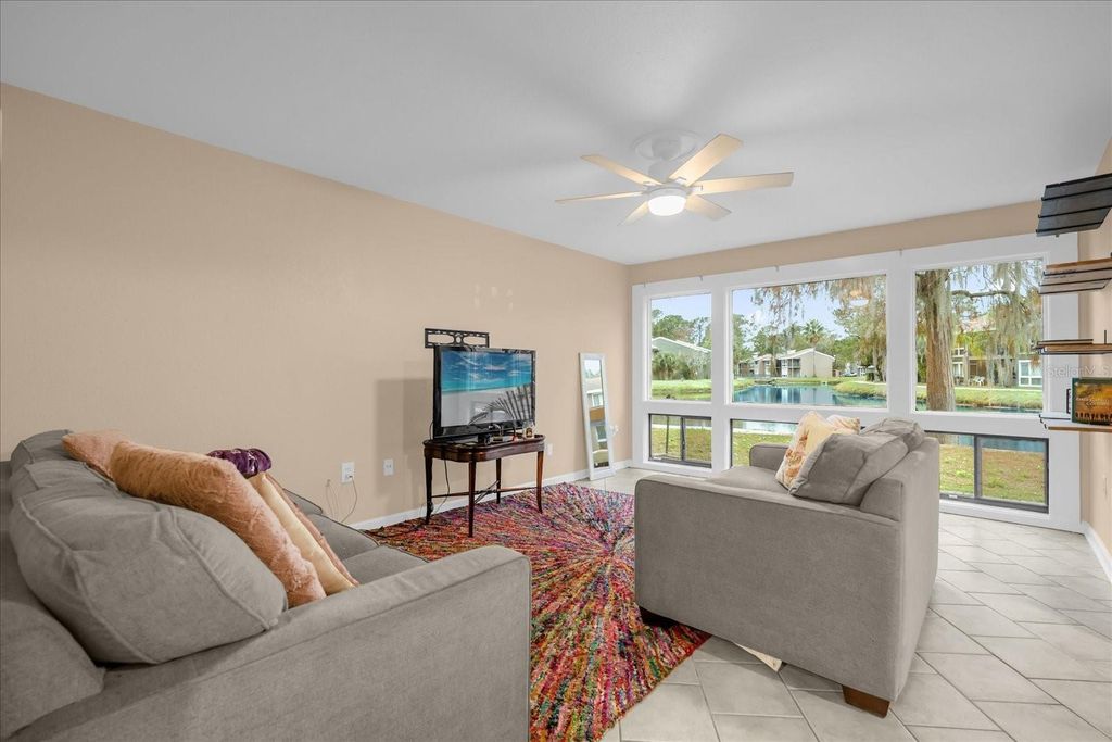 Photo of 5842 Peregrine Avenue #C01, Orlando, FL 32819 (MLS # O6386499)
