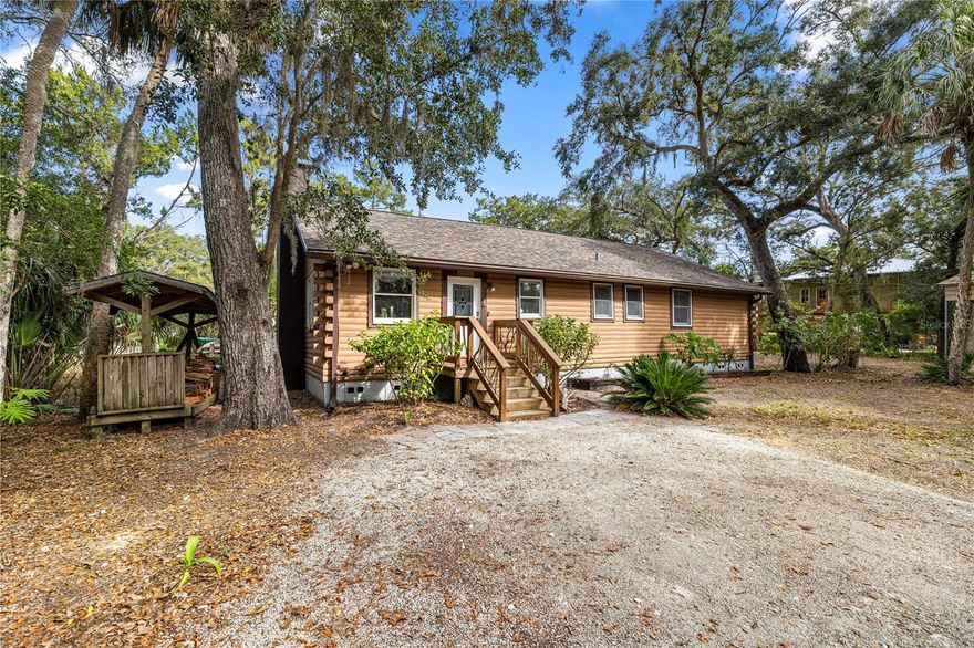Welcome to your fully furnished dream retreat! This charming 3-bedroom, 2-bathroom log cabin tucked away on the beautiful Homosassa, is the perfect mix of cozy rustic vibes and modern convenience, making it the ultimate spot to kick back and relax. Imagine waking up to those peaceful water views, sipping your morning coffee on the lanai or private dock, and spending your days exploring all the natural beauty that makes Homosassa so special.
If you love being on the water this home offers Gulf access, so you can keep your boat at your own private dock and be out on the open water in no time. For even more convenience, there is a private community boat ramp located right across the street, making it incredibly easy to launch and go. Whether you’re looking for the perfect fishing retreat with the guys or a unique family retreat where the kids can enjoy nature, this cabin fits the bill perfectly.
Location is everything, and this spot puts you just minutes away from some of the best waterfront restaurants and local attractions in the area. Plus, with scalloping season right around the corner, there’s no better time to make this your home base. You’ll be right in the heart of the action while still having your own quiet sanctuary to return to.
The cabin is being sold fully furnished, so you can move right in or immediately make income as a fantastic vacation rental. It’s an amazing investment opportunity that can start generating income from day one making it essentially a piece of paradise that can pay for itself! You can rest easy knowing the big stuff has been taken care of, too, including a new roof in 2021, a brand-new RV or boat port for your extra toys, completely renovated interior, and updated dock.
This isn’t just a house... it’s a whole new lifestyle! Spend your days fishing, boating, and soaking up that Florida sunshine, and your evenings watching the sunset over the canal. Don't miss your chance to own this slice of the Nature Coast.