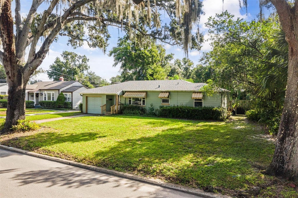 Photo of 1409 N Westmoreland Drive, Orlando, FL 32804 (MLS # O6444351)