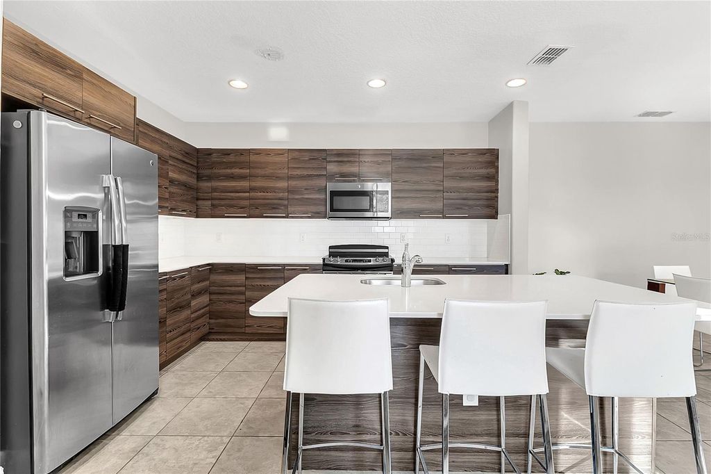 Photo of 105 Kenny Boulevard, Haines City, FL 33844 (MLS # S5139447)