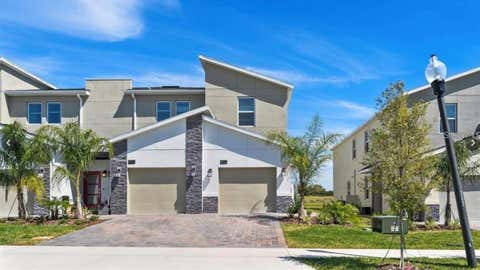 Photo of 857 Ocean Course Avenue #857, Davenport, FL 33896 (MLS # O6421683)