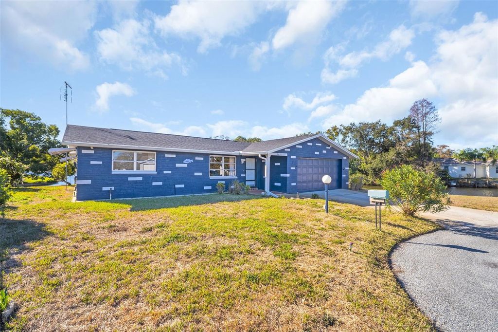 Photo of 7230 Bradshaw Drive, New Port Richey, FL 34653 (MLS # TB8457499)