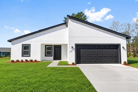 Photo of 13592 SW 40 Circle, Ocala, FL 34473 (MLS # O6451649)