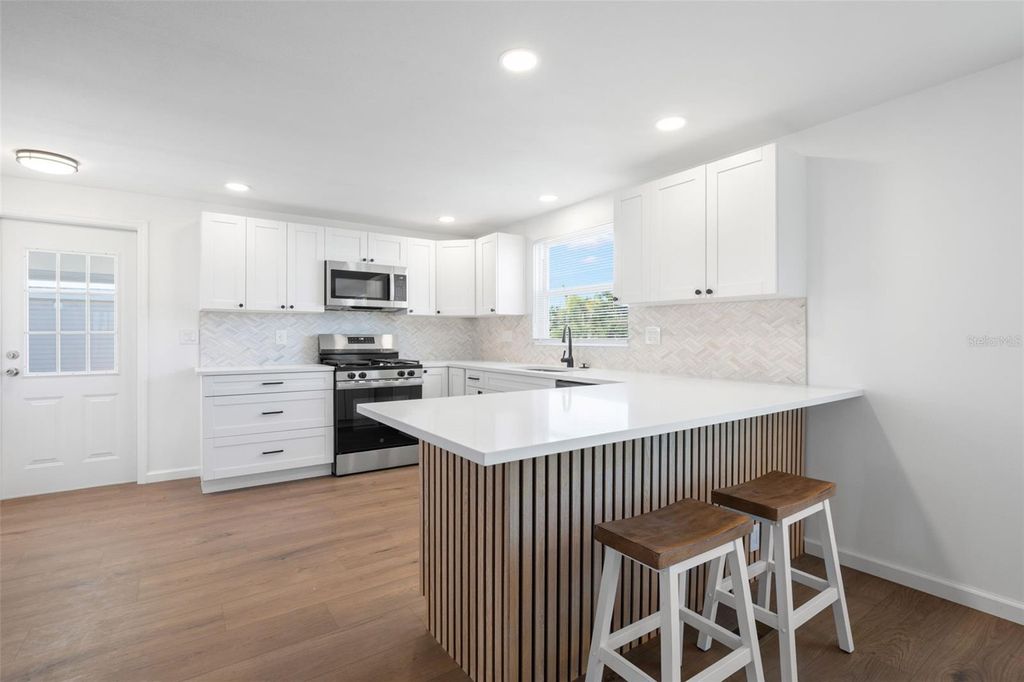 Photo of 7271 Mount Arlington Drive NE #430, St Petersburg, FL 33702 (MLS # TB8490115)