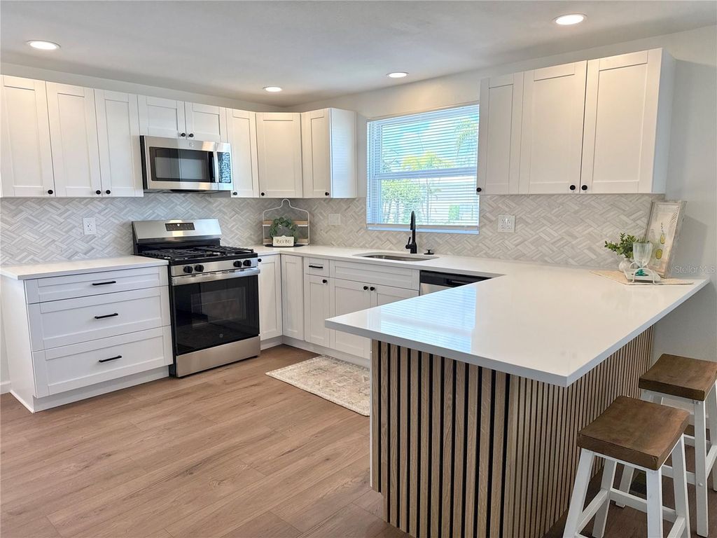 Photo of 7271 Mount Arlington Drive NE #430, St Petersburg, FL 33702 (MLS # TB8490115)