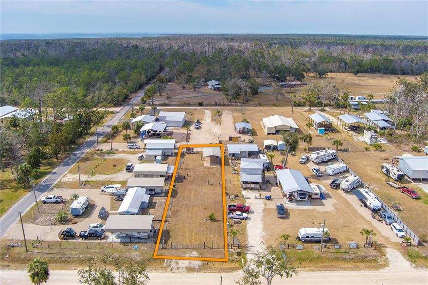 Welcome to your slice of paradise in Steinhatchee, Florida — where the scallops are fresh, the sunsets are golden, and the income potential is real. This fully fenced .26-acre property is currently set up as a high-demand camper/RV lot and is also fully buildable, offering flexibility for investment, vacation use, or future construction. Already equipped with major infrastructure, this property is ready to generate income or serve as your personal getaway from day one. Property features include: 200-amp electric service, City Water, Septic holding tank (pump-out service rotation — not a traditional drain field) Two (2) RV hookups — 30 amp & 50 amp, Metal shelter on site with #57 rock base for superior drainage & camper stability. RARE OPPORTUNITY: This property is GRANDFATHERED to accommodate FOUR (4) total units during festival and scalloping season — a major advantage for seasonal demand and income potential. Estimated rental rates of $85/night or $550/month per camper. Off-season allows up to three campers on site. Located in a golf-cart-friendly community, just a short ride to local marinas, restaurants, schools, and all the charm of the Steinhatchee lifestyle. Summer is calling — bring the family, park your boat and RV, catch your scallops, and cook them over a fire pit. This is Florida living with built-in opportunity. Talk about location. Talk about income. Talk about flexibility. Seller motivated — BRING REASONABLE OFFERS! New to "Hatch"? Steinhatchee Florida is a small coastal fishing village on Florida's Nature Coast known for its laid-back vibe, outdoor lifestyle, and serious income potential for vacation rentals. Its all about boating, scalloping, and Old Florida charm. One of Florida's top destinations for bay scalloping (summer hotspot). Direct access to Gulf of America/Mexico, Trophy redfish, trout, grouper, and offshore fishing. Deep-water access via the Steinhatchee River, Public Boat Ramps and FULL SERVICE marinas. Nearby Springs and Nature Trails, Incredible sunsets and quiet coastal scenery. About 1 hour from Gainesville FL, 2-3 hours from Tampa and Tallahassee. A favorite HIDDEN escape for weekend trips and family vacations!
