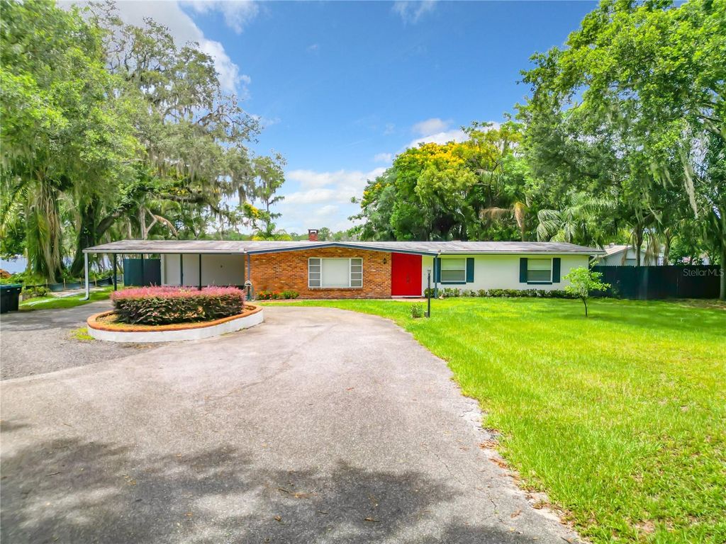 Photo of 9999 Lake Georgia Drive, Orlando, FL 32817 (MLS # O6392154)