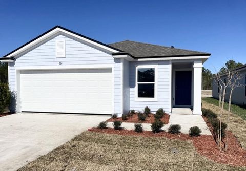 Photo of 861 Grand Reserve Drive, Bunnell, FL 32110 (MLS # FC314659)