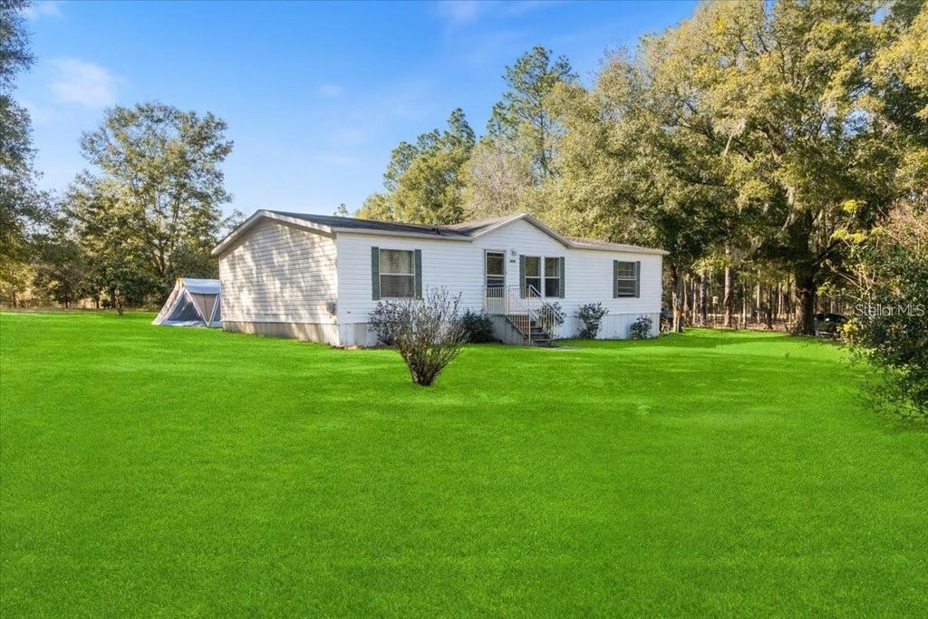 Photo of 3230 SW 189th Avenue, Dunnellon, FL 34432 (MLS # O6342475)