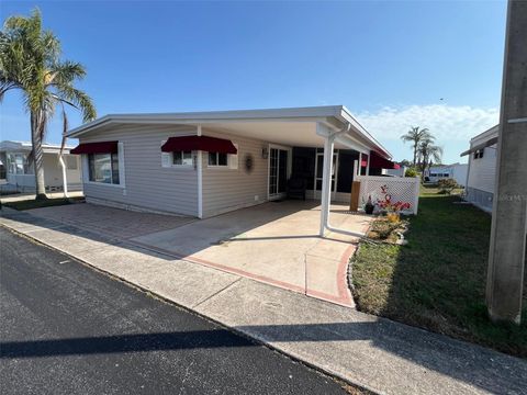 Photo of 215 Royal Palm Circle, Largo, FL 33778 (MLS # TB8444011)