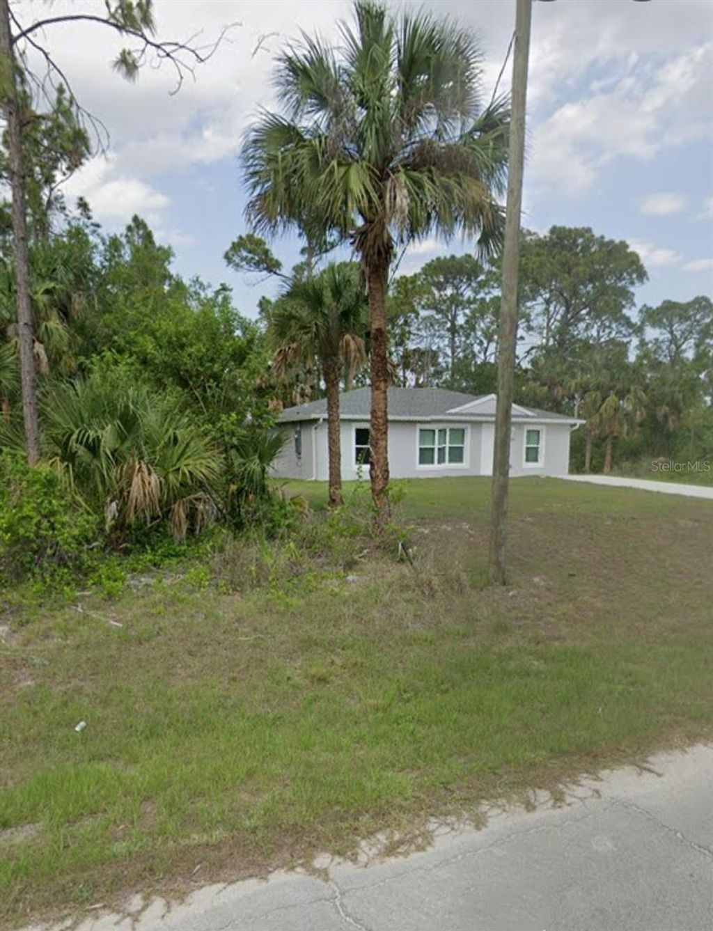 Photo of 5014 S Obispo Circle, Labelle, FL 33935 (MLS # TB8435660)