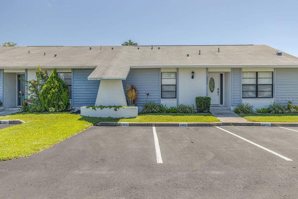 This spacious and well-maintained 2 bedroom 2 bath end-unit Villa offers an exceptional floor plan, perfect for the active Florida lifestyle. The nearly 1,300 square-foot home features a large kitchen with ample cabinetry and a breakfast bar, seamlessly flowing into the family and dining areas with wood floors and sliders leading to a screened lanai. The Villa includes 6-panel interior doors, tile baths, and an interior laundry closet. The backyard features a convenient shed, providing ample space for additional storage. Located in the heart of Oldsmar, this rare opportunity places you within walking distance to the Oldsmar Trail, connecting to Sheffield Park, Safety Harbor, and Mobbly Bay, offering beautiful sunsets, nature walks, and wildlife. The community includes ground maintenance and a pristine swimming pool for just $110/month HOA. You'll also enjoy nearby amenities such as tennis courts, athletic fields, playgrounds, shopping, dining, and world-class beaches. This Villa is truly a gem, offering both convenience and the best of Florida living. Property did not flood and didn’t loose the electricity during Helene and Milton!