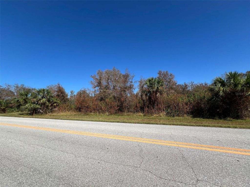 Photo of 13224 Marathon Boulevard, Port Charlotte, FL 33981 (MLS # O6254898)