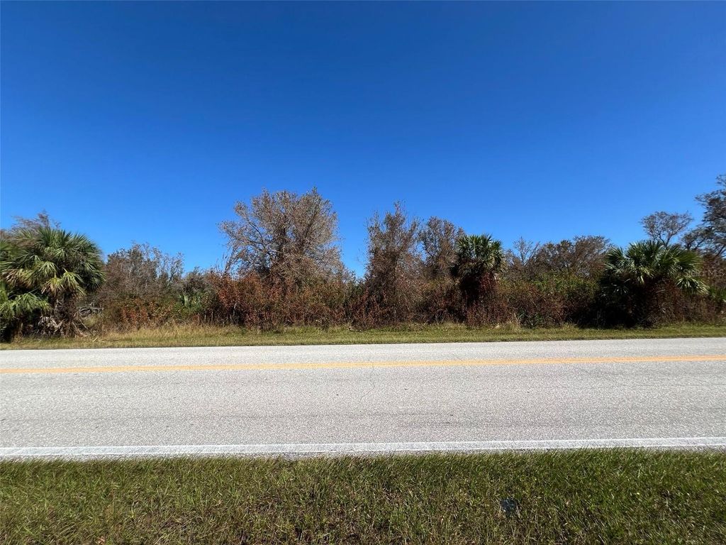 Photo of 13224 Marathon Boulevard, Port Charlotte, FL 33981 (MLS # O6254898)