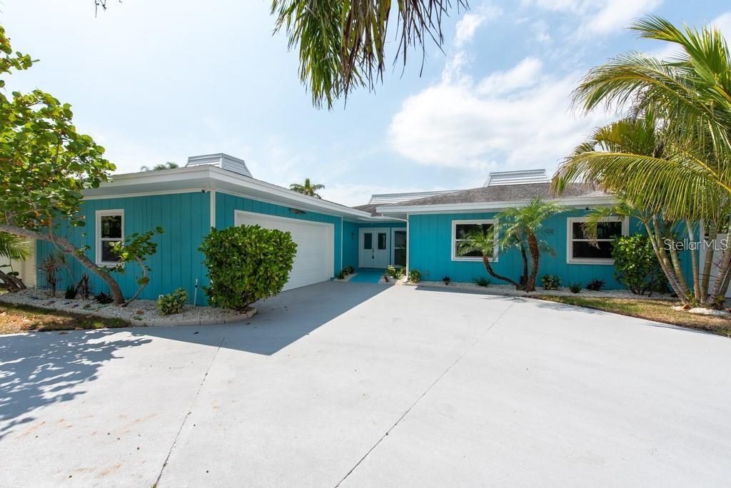 ** Your monthly rent INCLUDES professional house cleaning, lawn care , and pool maintenance- Luxury living with Zero upkeep! This stunning, fully remodeled waterfront oasis in Tampa Bay checks every box for luxury, functionality, and fun. With 3 bedrooms, 3 full bathrooms, and 1,868 square feet of updated living space, this one-story beauty blends modern design with resort-style living in one of Tampa’s most desirable boating communities. Step inside to discover a show-stopping open-concept layout adorned with oversized 2x4 ceramic tile flooring that flows seamlessly throughout the home. The custom-built wine cellar with elegant glass doors and a massive electric fireplace creates an upscale ambiance perfect for both entertaining and relaxing. The heart of the home is the kitchen—outfitted with striking blue cabinetry, stainless steel appliances, and waterfront views that will inspire your inner gourmet. All windows are hurricane-rated, including the breathtaking 4-panel PGT sliding glass wall that fully opens to reveal your private outdoor paradise. The backyard retreat features a heated pool under a massive screened enclosure, a pergola-covered lounge area, and a 200+ square foot dock complete with a 6,000-pound boat lift. With no bridges to the bay, this is a boater's dream come true. Whether you're heading out to dinner by boat or soaking in golden hour views over the canal, this home delivers the ultimate Florida lifestyle. The heated and cooled two-car garage (with brand-new epoxy floors) adds 462 square feet of bonus space—perfect for a game room, gym, or additional guest suite. The oversized driveway offers room to store a camper, boat, or jet skis, making this property as practical as it is impressive. Other major updates include a new A/C, electrical system, windows, kitchen, bathrooms, and flooring—every inch of this home has been meticulously improved. Location perks? You're just minutes from top-rated dining spots like Bahama Breeze, Hula Bay, Salt Shack, and downtown destinations including Safety Harbor and the St. Pete Pier. Easy access to the Veteran's Expressway, I-275, and just 10 minutes from Tampa International Airport means you're never far from where you need to be. Don't miss this rare opportunity to own a turnkey, waterfront masterpiece in Bay Crest—where every day feels like a vacation. Call now and schedule your showing today!