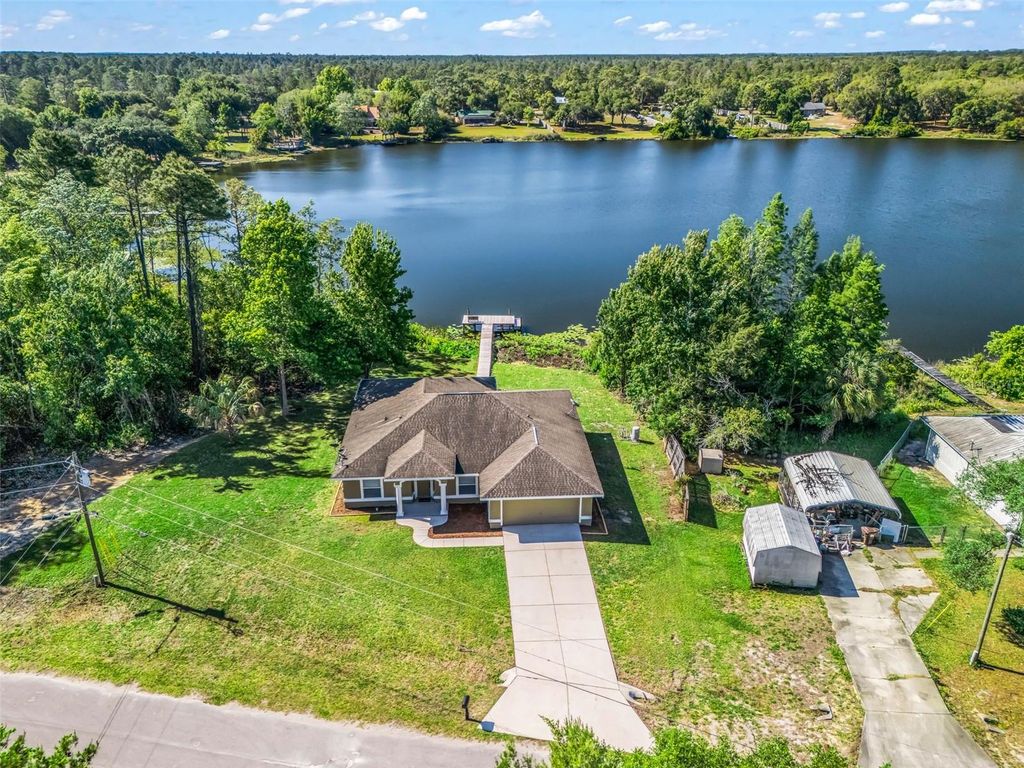 Photo of 214 Fisher Run, Ocklawaha, FL 32179 (MLS # OM724104)