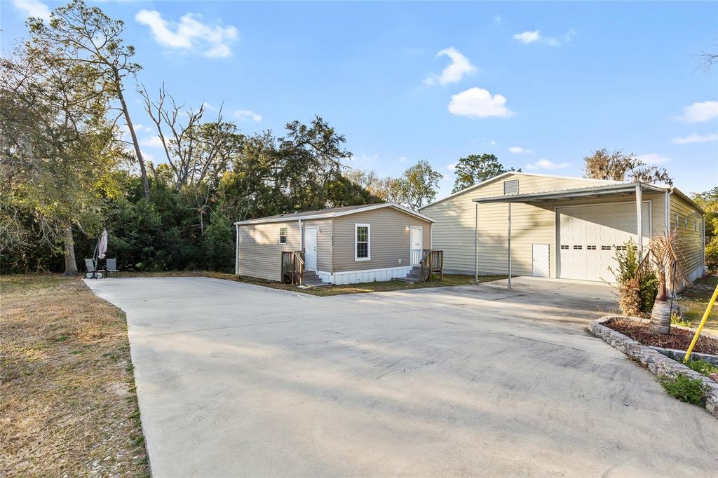 Photo of 5937 Penny Royal Road, Wesley Chapel, FL 33545 (MLS # TB8478308)