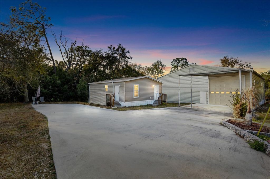 Photo of 5937 Penny Royal Road, Wesley Chapel, FL 33545 (MLS # TB8478308)