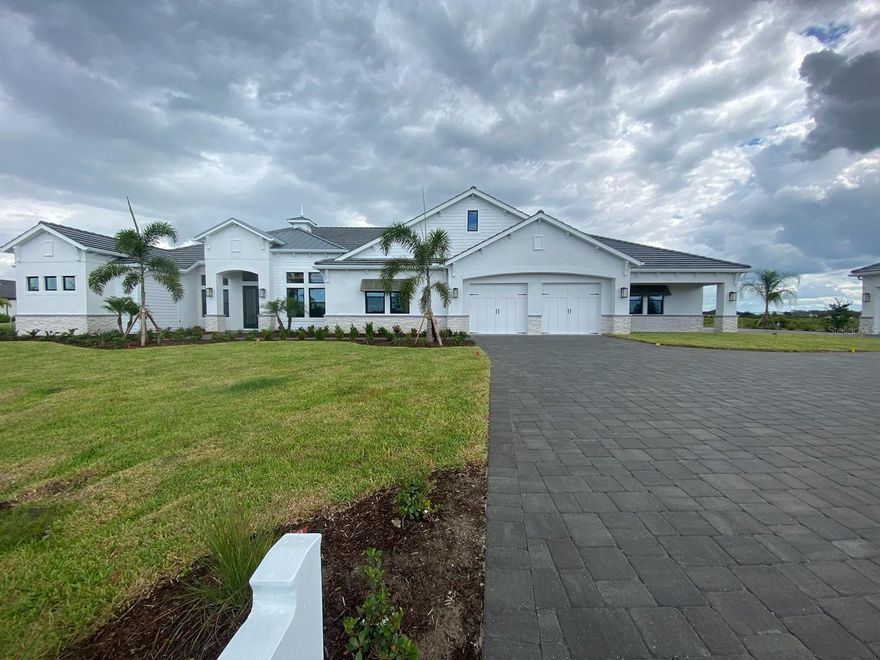 Modern Coastal Farmhouse a cross between Modern, contemporary and Farmhouse. Stunning Medallion Built Grand Cayman model in a one of a kind setting with 7 acres.  4 bedrooms and 4 bathrooms with 4 car garage and 4 car separate detached garage to fit all your toys. Stunning cross between modern contemporary and farm house.  Open floor plan with a stunning kitchen with a 6 burner gas stove and built in ovens and warmer drawer and a large walk in pantry.  To enjoy the acreage there is a huge lanai with an oversized pool and hot tub with full open screens. Paved driveway and a picket fence finish off this beautiful home.