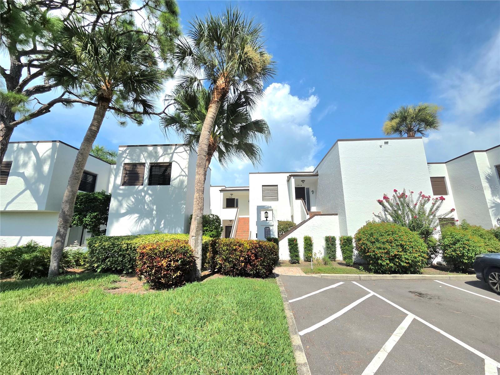 Welcome to your fully furnished condominium in the Heronmere I section of the Meadows! This stunning 2-bedroom, 2-bathroom condominium offers breathtaking views of the Meadows Country Club golf course. As you approach your new condominium, you'll be greeted by a well manicured landscaping and a contemporary style exterior. Step inside and prepare to be amazed by this open floor plan. The well sized kitchen features stainless steel appliances(range, microwave, and dishwasher). The spacious living areas, including the great room, dining room, and enclosed lanai, offer a comfortable and inviting atmosphere. The master bathroom has been tastefully updated to create the complete the experience. The master suite is a true sanctuary, boasting a generous bedroom with a walk-in closet and an updated bathroom featuring updated cabinets, stone countertops, undermount sink, decorative mirror, lights, plumbing fixtures, and custom shower with tiled walls and floor. The guest bath features updated decorative mirror and lighting. Step outside to your very own oasis. The spacious enclosed lanai with tile flooring and an additional open patio provide the perfect spot to relax and enjoy the Florida sunshine. And with a stunning golf course view as your backdrop, you'll feel like you're on vacation every day. A convenient one assigned space for parking and additional guest parking gives you the parking you need for family and friends. Don't miss your chance to own this incredible condominium in the Meadows. Convenient community pool within walking distance. There are walking and biking trails throughout the picturesque Meadows community for all of your leisurely outdoor activities. University Town Center(UTC) is within minutes featuring 30+ restaurants, shopping, dining and entertainment. Whether you looking to go to the beach, additional shopping, or the Arts(live performing arts, opera, ballet, orchestra) Lido Beach and downtown Sarasota are within about 20 minutes of this centrally located condominium in the Meadows.