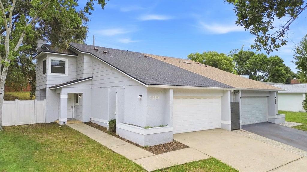 Photo of 7215 Harbor Heights Circle, Orlando, FL 32835 (MLS # TB8516481)