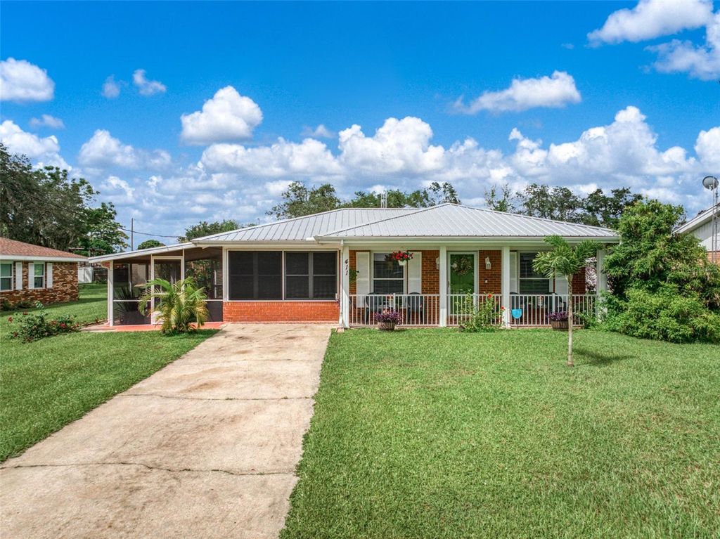 Photo of 411 E Elm Street, Avon Park, FL 33825 (MLS # OM709872)