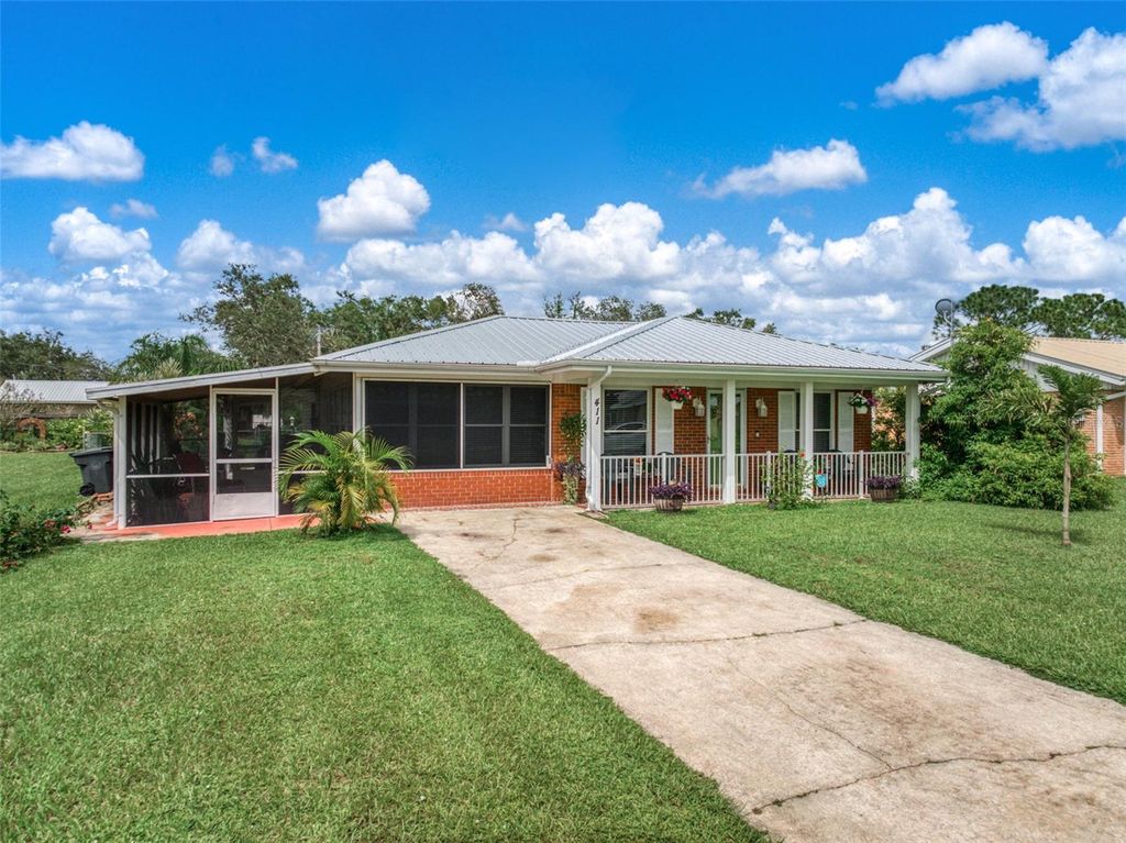 Photo of 411 E Elm Street, Avon Park, FL 33825 (MLS # OM709872)