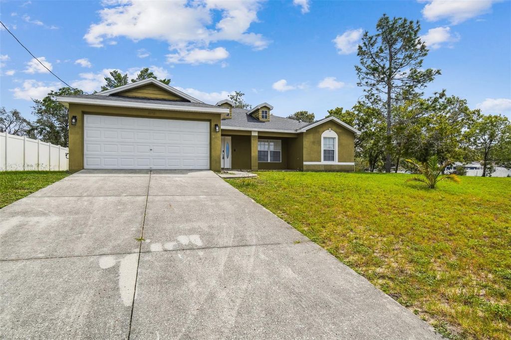 Photo of 2222 Champlain Avenue, Spring Hill, FL 34609 (MLS # TB8434623)