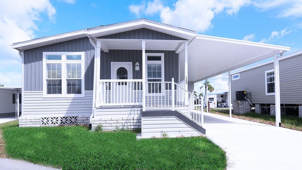 Photo of 150 Maui Drive, Palmetto, FL 34221 (MLS # A4498791)