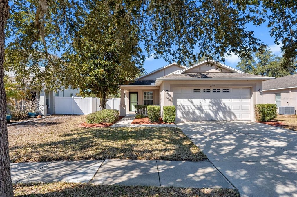 Photo of 12311 Boot Spur Way, Spring Hill, FL 34610 (MLS # TB8476251)