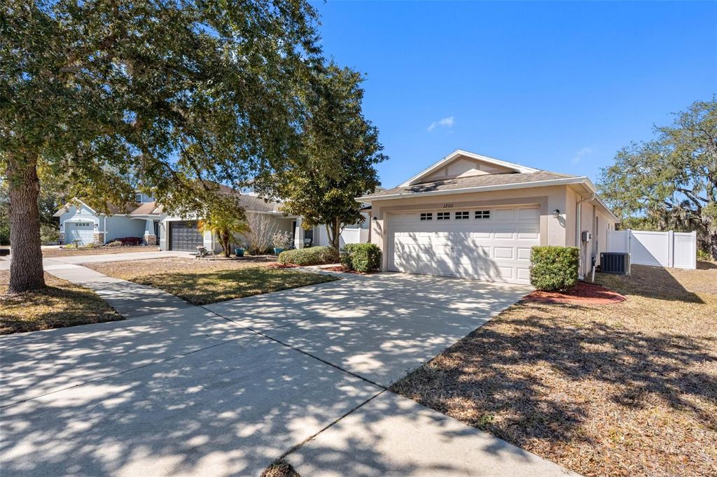 Photo of 12311 Boot Spur Way, Spring Hill, FL 34610 (MLS # TB8476251)