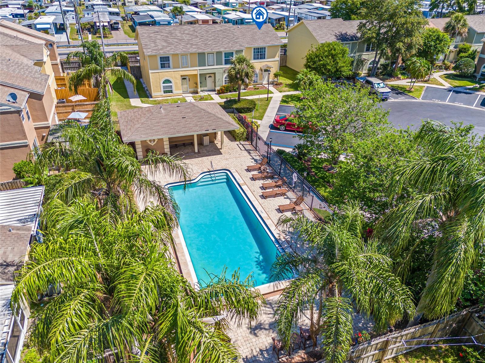 Welcome to the beautiful LOCATION of the Chateaux De Ville community, centrally located in Clearwater. NO FLOOD ZONE. This townhouse offers a perfect blend of comfort and luxury. FULLY FURNISHED. Just 6 miles from the beach offers easy access to coastal activities, making it great for beach lovers and those who enjoy outdoor living. This spacious 2-bedroom, 2.5-bathroom townhouse offers a cozy haven for those seeking a convenient and inviting living space end unit townhome features 2 bedrooms and 2 ½ bathrooms. As you walk up to the front door, you are greeted by a beautifully landscaped lawn that is all maintained by the association. Enter the front door, and you immediately notice all of the amazing Florida sunshine pouring in the townhome. The kitchen is perfect for all your cooking needs and has enough space for an eat-in bistro table for your morning cup of coffee as you catch the birds flying by the front window. Make sure to notice the expansive counter space and beautiful updated home. ROOF 2023, A/C 2023., SMART FEATURE APPLIANCES 2023. Laundry room is separate and Washer & Dryer stays for convenience. Just to the right of the kitchen, you will find the guest half bathroom that is ideal for any guest. In addition to the comfort of your living enjoy the electric fireplace. There is plenty of space for a dining table if you wish or you can have an extra-large living room to host all of your family and friends together. Both bedrooms are on the second floor and have their en-suite fill bathroom. There is also a half bath powder room for guest on the first floor. The glass doors open up beautifully to open lanai where you can sit back and enjoy unobstructed nature views. Upstairs, you will find the two guest bedrooms, which are both ample in size and have large closets. The guest bathroom is ideal for any guest and features a tub and shower combination. On the opposite side, you will find the primary suite with a large and an ensuite bathroom. Make sure to check out the expansive side yard that is perfect for letting the dog run outside or throwing a football with friends, also, the yard can be fenced in if you want! The sparkling community pool is just at the end of the road, and the low HOA fee is a bonus! HOA covers building exterior, ground maintenance, trash, and community pool. Close to Clearwater Mall, shops and restaurants. 25 minutes from Tampa International Airport. This townhouse offers spacious and comfortable living spaces, modern amenities, and a convenient location. It's the ideal place to call home, where you can create lasting memories in a welcoming and luxurious setting. Centrally located to St Petersburg, Largo, Palm Harbor, Safety Harbor, all the surrounding restaurants, Shopping Mall, and amenities. Clearwater Beach is all within reach of 20 20-minute drive or less.
