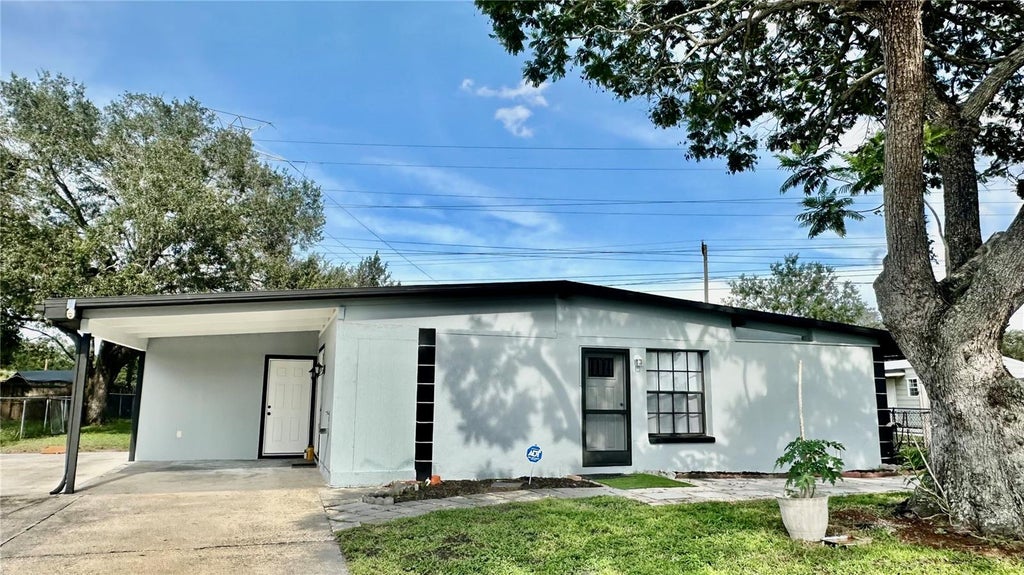 Photo of 1312 Windsor Way, Tampa, FL 33619 (MLS # TB8547833)