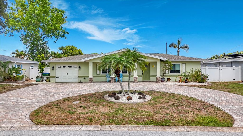 Photo of 5163 60th Way N, Kenneth City, FL 33709 (MLS # TB8511346)