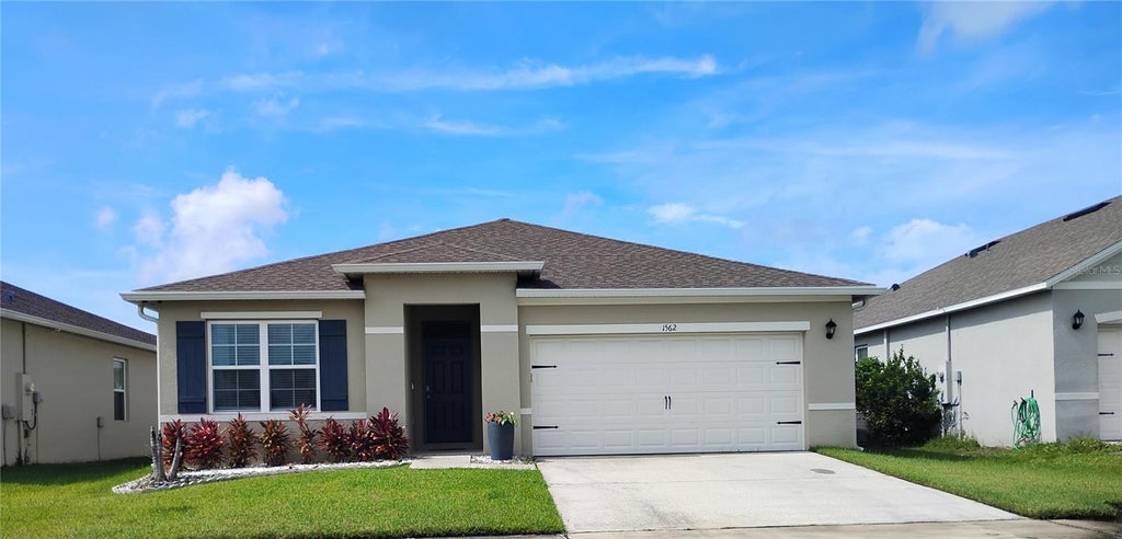 Photo of 1562 Oak Reserve Drive, Kissimmee, FL 34744 (MLS # O6451685)