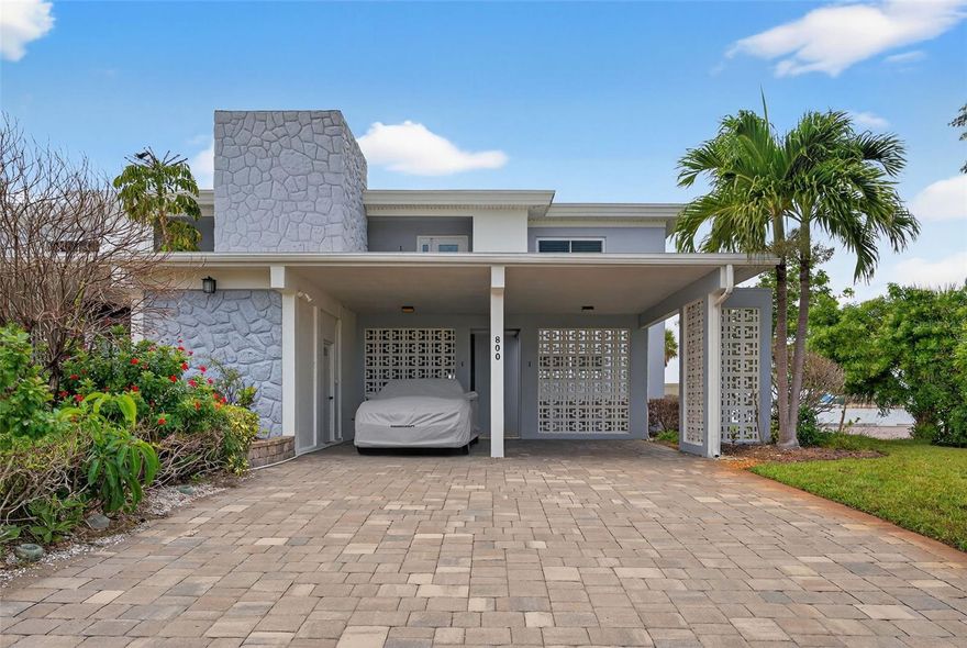 Don’t miss this rare opportunity to enjoy LUXURY WATERFRONT LIVING BELOW MARKET VALUE! This exceptional top-floor condo offers PANORAMIC VIEWS of the Pass-A-Grille channel and nearly 2,000 square feet of beautifully designed living space. COMPLETELY RENOVATED with thoughtful, high-end upgrades throughout, this one-of-a-kind residence seamlessly blends elegance, comfort, and peace of mind. A bright, open layout welcomes you in—perfect for both entertaining and everyday living. The chef’s kitchen is appointed with soft-close cabinetry, granite countertops, and GE appliances with a transferable warranty. Multiple living and dining areas provide flexibility and flow, complemented by a spacious laundry room and a versatile den or office. Travertine flooring runs throughout the home, along with hurricane-rated windows and doors for added security and efficiency. All three bedrooms feature full en-suite baths, including a newly renovated primary bathroom and generous walk-in closets. Step through the sliding glass doors onto your screened lanai and soak in sweeping water views, where dolphins, stingrays, and passing boats create a serene, ever-changing backdrop. This inviting outdoor space is ideal for quiet mornings, sunset evenings, or hosting family and friends. Additional highlights include two covered, under-building parking spaces, two second-floor storage closets, and stable condo fees that have remained unchanged for over two years. This TOP-FLOOR SANCTUARY combines modern luxury, breathtaking scenery, and resort-style amenities within a forward-thinking community. MOTIVATED SELLERS are offering to cover one full year of condo fees, making this an extraordinary value.