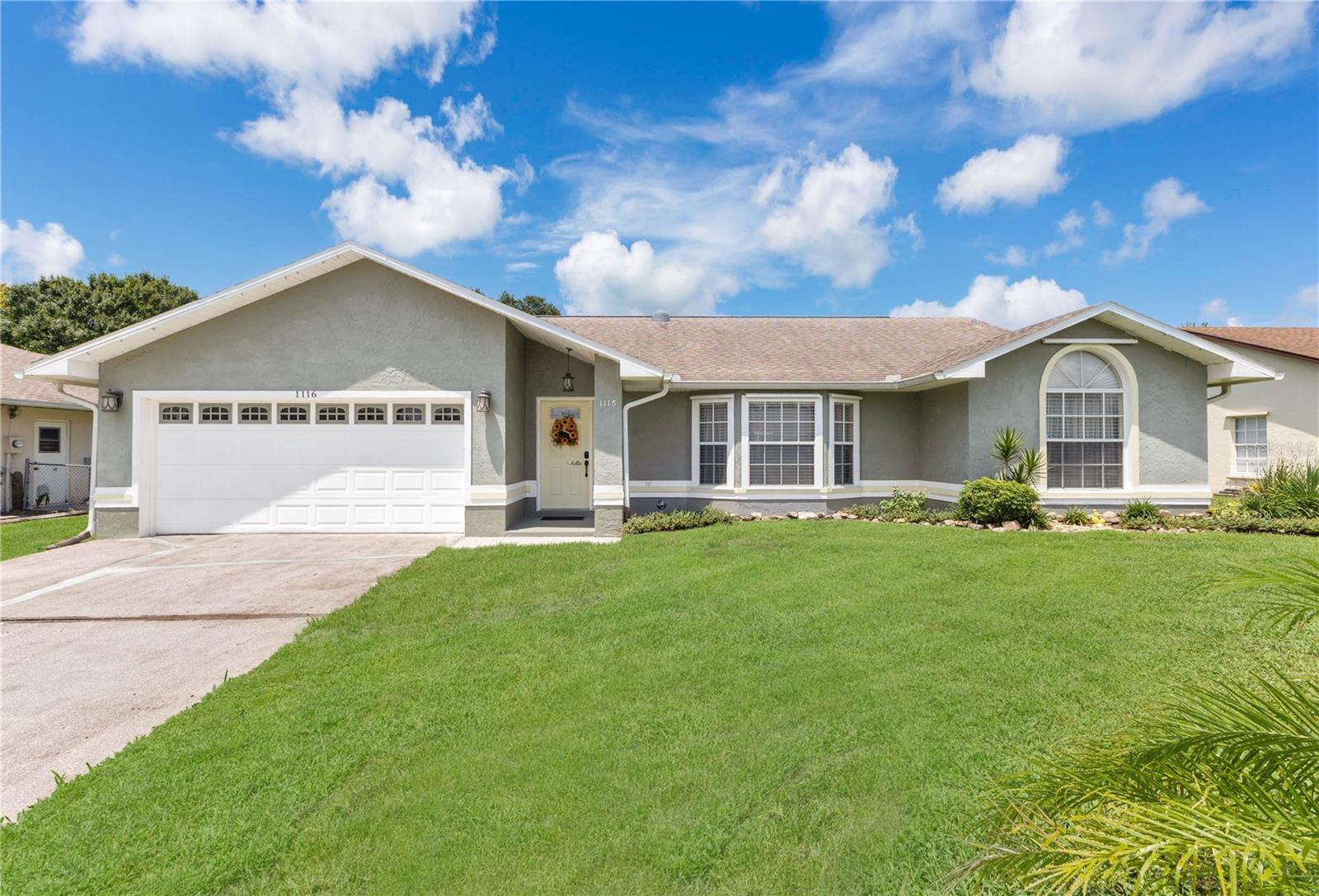 This colorful 4-bedroom, 2-bathroom home with unmistakable Key West charm is nestled in the quiet, well-established neighborhood of Canoe Creek Woods, just 40 minutes from downtown Orlando, the airport, and major attractions, with easy access to the Turnpike. Step inside to an inviting open floor plan featuring upgraded cabinets, fresh paint throughout (including doors and moldings), and all-new hardware, fixtures, lighting, and ceiling fans. The kitchen flows seamlessly into the living areas and offers seating for 10 overlooking the water, where you can enjoy an abundance of birdlife. Thoughtful updates include a new tankless hot water heater, dishwasher, updated plumbing fixtures, and new fire alarm detectors. Outdoors, enjoy a sparkling pool with heat pump and newly rescreened enclosure, a detached 8x10 shed, hurricane shutters, irrigation system, and epoxy garage flooring. With dual attic access for extra storage, this home also places you just 45 minutes from the beaches of Melbourne, a few miles from historic downtown St. Cloud, and just minutes of the Royal St. Cloud Golf Course—making it a true Florida gem.