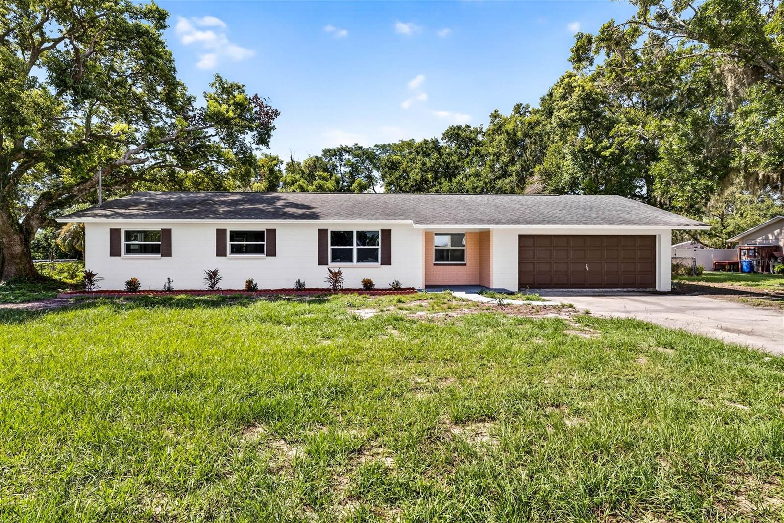 Tucked away in one of the area’s best-kept secret neighborhoods—quiet, and charming. Situated on just over 1/2 Acre, is this beautiful mid century style home. Terrazo floor has been restored to its glory and the welcoming open floor plan flows through the home. Brand new appliances, updated bathrooms and kitchen all you need to do is move in. Not to mention a bonus room that can be turned into an office. The exterior has been freshly painted and enhanced with t landscaping adding curb appeal. Inside, you’ll find generously sized rooms that make the home feel larger than its square footage suggests. The oversized garage includes a dedicated laundry area. The fenced backyard is nearly 150 feet deep with more than enough room for future projects! Do not miss this opportunity to own this tranquil beauty!