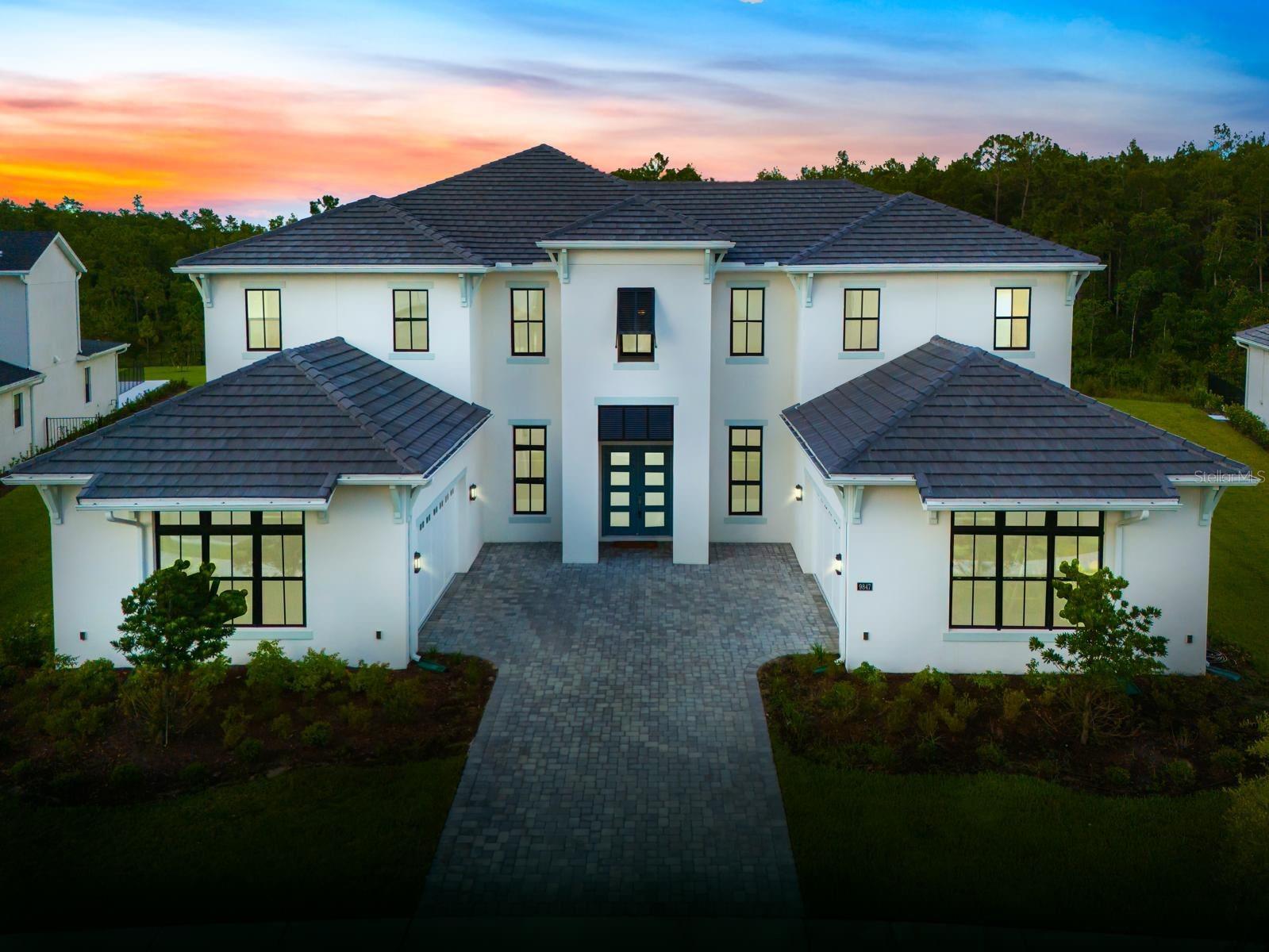 Welcome to this exceptional home in the prestigious Laurel Pointe community of Lake Nona, set on the largest lot in the neighborhood—a stunning .69-acre estate that offers unparalleled privacy. This sprawling property features 7,093 sq. ft. of living space with 6 spacious bedrooms and 6.5 luxurious bathrooms.
Upon entering, you'll be greeted by high ceilings and an open-concept floor plan, creating an inviting and spacious atmosphere. The gourmet kitchen is a standout, with marble countertops, top-of-the-line appliances, and a large central island, ideal for entertaining. The rooms are also equipped with a vacuum system, providing added convenience for easy clean-up.
The master suite is a true retreat, offering a tranquil escape with its expansive layout, dual vanity areas, freestanding bathtub, and a walk-in glass-enclosed shower.
Enjoy the Florida lifestyle with two outdoor patio areas, perfect for relaxing or hosting gatherings under the stars, all set within meticulously landscaped grounds.
Additional highlights include two attached garages, each with room for two cars, providing ample storage space. This home is located within Lake Nona, known for its healthcare, technology, and wellness focus, and offers access to miles of scenic trails, lush parks, and top-rated amenities.
Minutes from Lake Nona Medical City, the VA Hospital, and major highways, you're also just a short drive from Orlando International Airport, theme parks, and Florida’s beautiful beaches. Experience the luxury and innovation that this exceptional property offers.