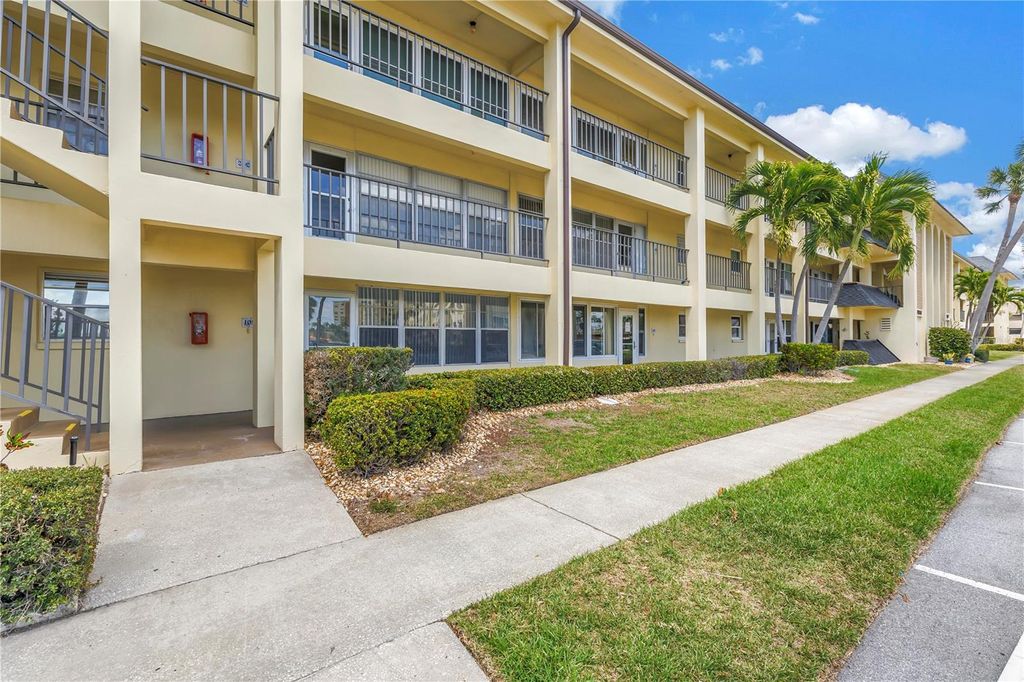 Photo of 4700 Cove Circle #103, St Petersburg, FL 33708 (MLS # TB8493191)