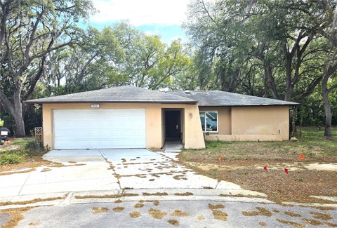 Photo of 10641 Timber Lane, Port Richey, FL 34668 (MLS # TB8520643)