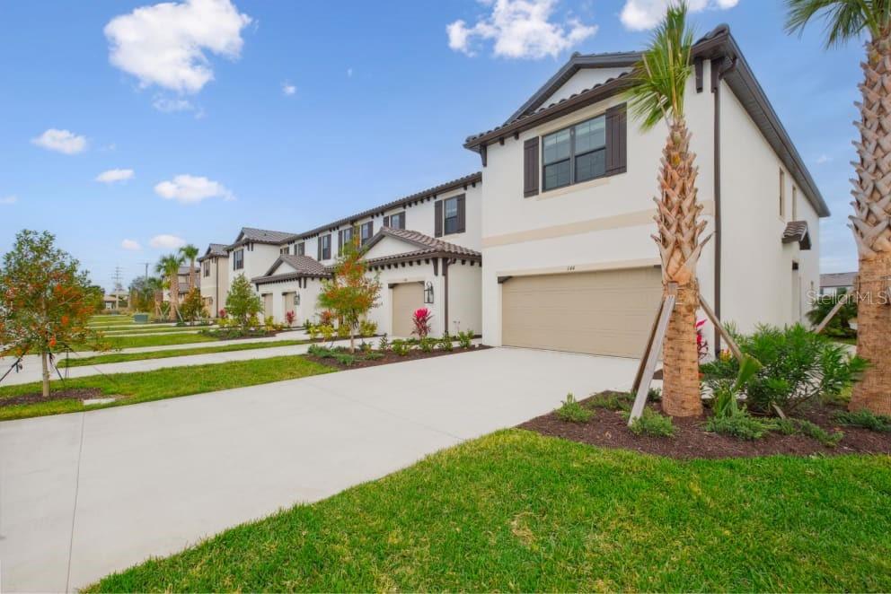 Currently offering 2 months free with a 13 month lease term! Prices, promotions, and availability are subject to change. Soak up the sun at Fiore, a collection of timelessly appointed, two-story townhomes enviably located in vibrant Venice, Florida. With expansive three-bedroom floor plans, generous high ceilings, and large lanais, Fiore offers space and serenity in abundance. Ensconced in lush landscaping, Fiore’s Mediterranean-inspired rental homes bring decadence to daily life. Immerse yourself in the dynamic culture of Nokomis while enjoying superior amenities, sought-after services, and a well-connected address at our community. Our townhomes in Venice, FL ensure you can enjoy all the urban conveniences you desire without sacrificing the peace you deserve. Our townhomes in Venice, FL, offer residents a delightful living experience in the best community in the area. Start the day with a morning swim in the resort-style pool, or round up your pups for a stroll through the dog park. Fiore places a premium on tranquility and leisure by providing superior social spaces enhanced with captivating water and preserve views. Inside your spacious home, unwind effortlessly with modern amenities like stunning quartz countertops, an in-home washer/dryer, and covered lanai porches.