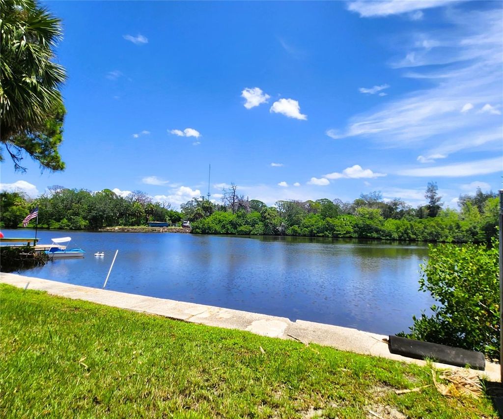 Photo of 6977 Edgewater Drive, New Port Richey, FL 34652 (MLS # TB8409516)