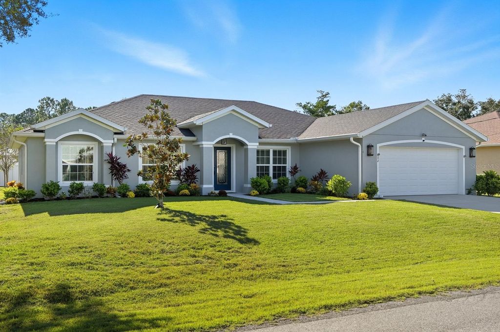 Photo of 42 Westglen Lane, Palm Coast, FL 32164 (MLS # FC313528)