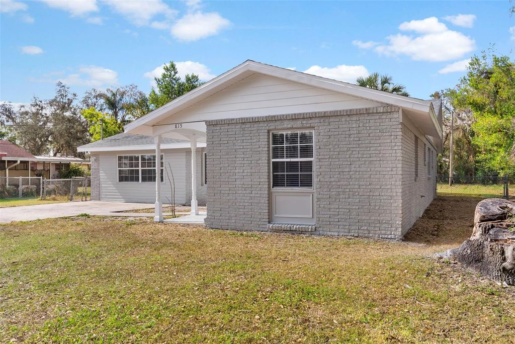 Photo of 815 N Hendry Avenue, Fort Meade, FL 33841 (MLS # L4959337)