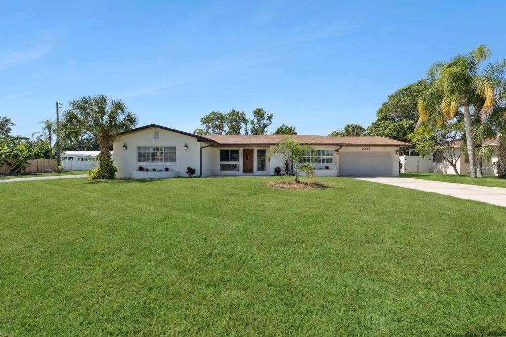 Photo of 2335 Tropical Shores Drive SE, St Petersburg, FL 33705 (MLS # A4683484)