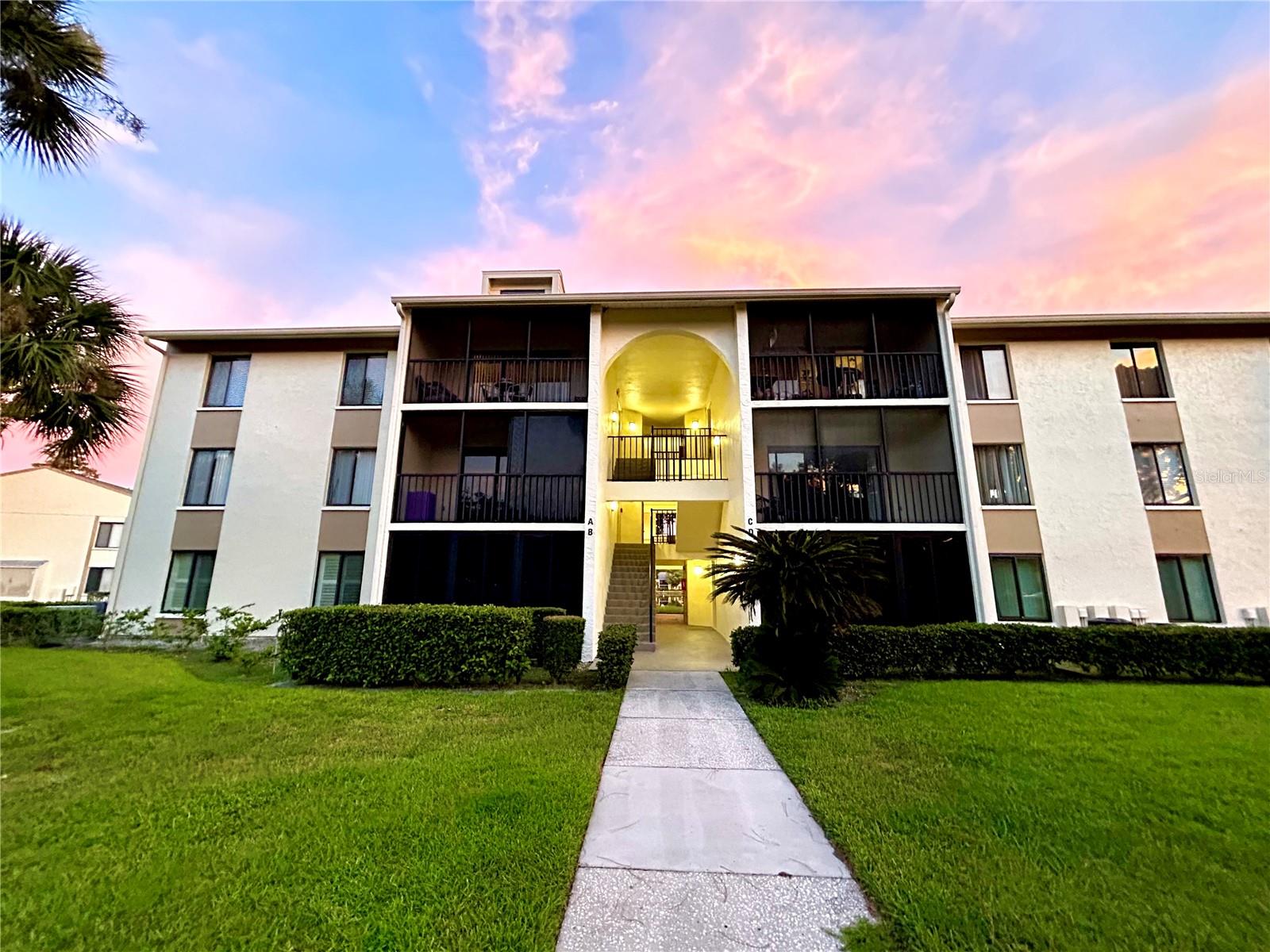 Condo for rent. 6 - 12 month rental (negotiable). Open floor plan with large rooms and lots of natural light. This well maintained, 2nd floor unit has a large screened in balcony to enjoy Florida warm beautiful weather. This well-maintained pet friendly complex has walking trails, beautiful lake w/ fountain, picnic tables w/ charcoal grills, clubhouse, tennis court, heated pool & jacuzzi. Conveniently located near Clearwater, Tampa International Airport, Tarpon Springs Sponge Docks, St. Pete, Beaches, Shopping, Dining & More. Convenient laundry, washer and dryer in unit. No age restrictions.
