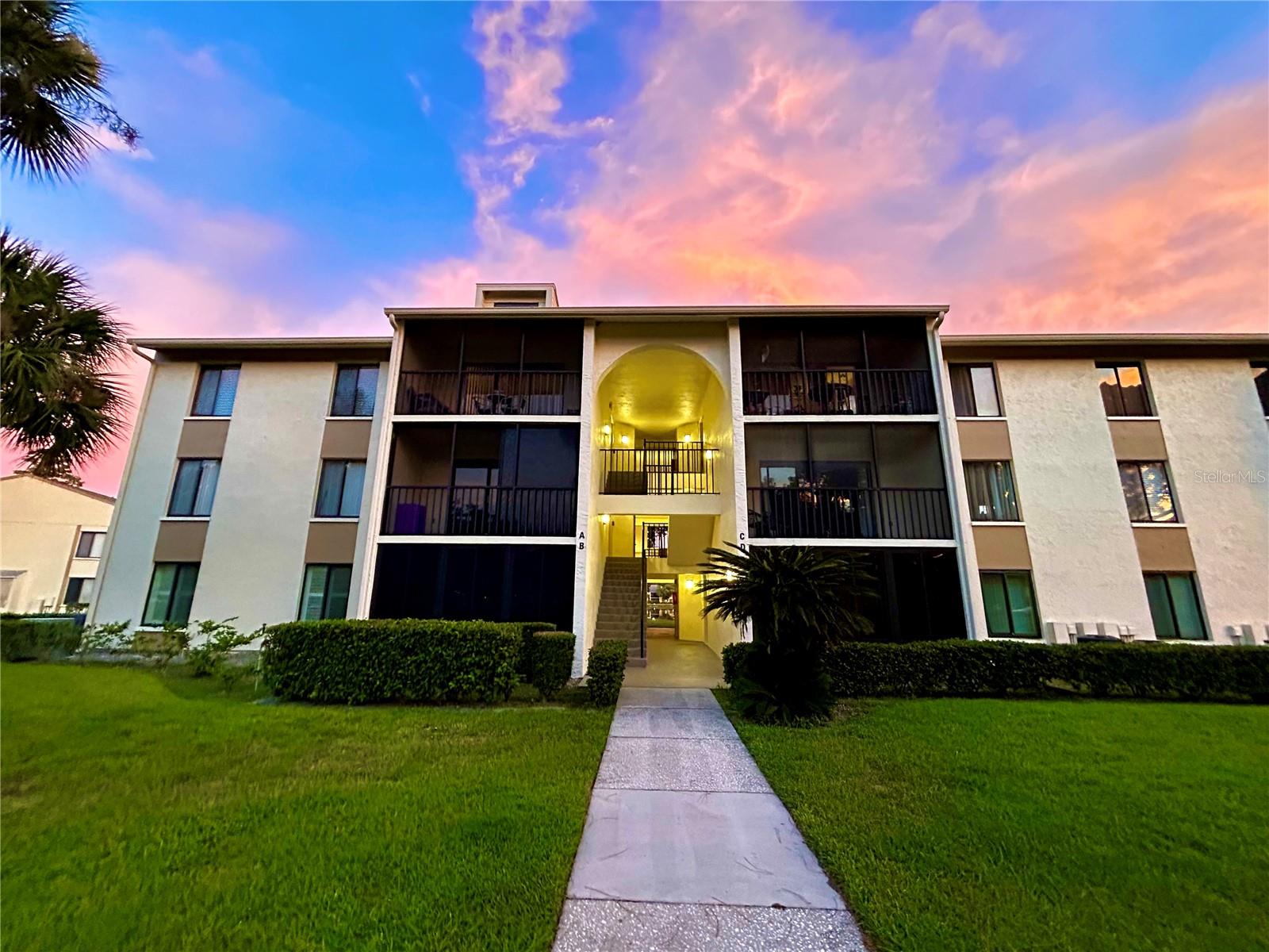 Condo for rent. 6 - 12 month rental (negotiable). Open floor plan with large rooms and lots of natural light. This well maintained, 2nd floor unit has a large screened in balcony to enjoy Florida warm beautiful weather. This well-maintained pet friendly complex has walking trails, beautiful lake w/ fountain, picnic tables w/ charcoal grills, clubhouse, tennis court, heated pool & jacuzzi. Conveniently located near Clearwater, Tampa International Airport, Tarpon Springs Sponge Docks, St. Pete, Beaches, Shopping, Dining & More. Convenient laundry, washer and dryer in unit. No age restrictions.