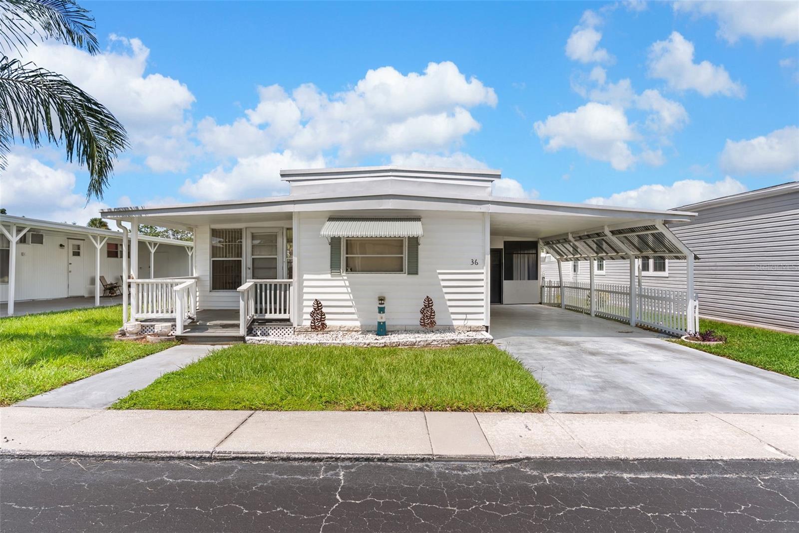 Welcome to Pointe West, a highly desirable 55+ Resident-Owned Community where shareholders enjoy both homeownership and membership in the community. This property does include the community share, which adds long term value to the next owner. This charming 2 bedroom, 2 bath manufactured home features new vinyl flooring in the kitchen and bathrooms, a spacious living area and an enclosed back porch with an attached shed perfect for a workshop or additional storage. The HVAC was replaced in 2017, and the water heater in 2020. The home may be sold furnished or unfurnished, offering flexibility for the next owner.
Situated in an X flood zone with no flooding from recent hurricanes, this home provides added peace of mind. The monthly maintenance fee of $300 covers water, sewer, garbage, and lawn care, which makes for easy, low-maintenance living.
Residents of Pointe West enjoy a rich variety of amenities, including a temperature-controlled pool with showers and restrooms, shuffleboard courts, two picnic areas with tiki huts, a boat ramp, a clubhouse with WiFi, a library, and a billiard room. With an active, welcoming neighborhood atmosphere, Pointe West is the perfect place to enjoy the Florida lifestyle.
